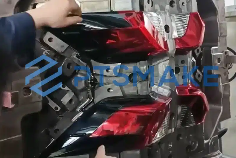 Checking red automotive tail light mold