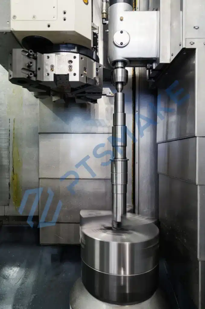 Vertical CNC machining of cylindrical metal