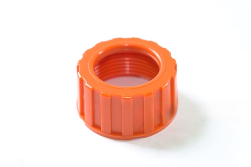 Orange plastic threaded cap