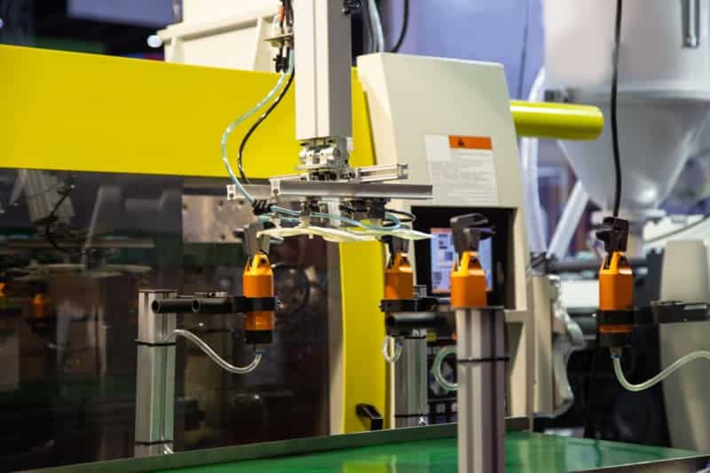 Automated robotic arm in manufacturing