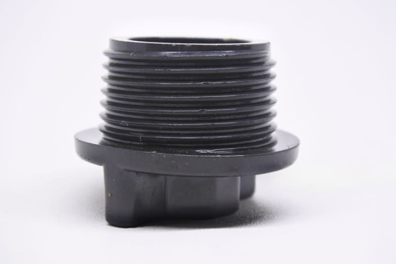 Black plastic threaded cap component