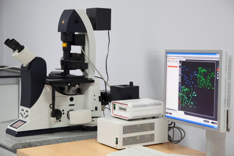 Scientific analysis with microscope and computer.