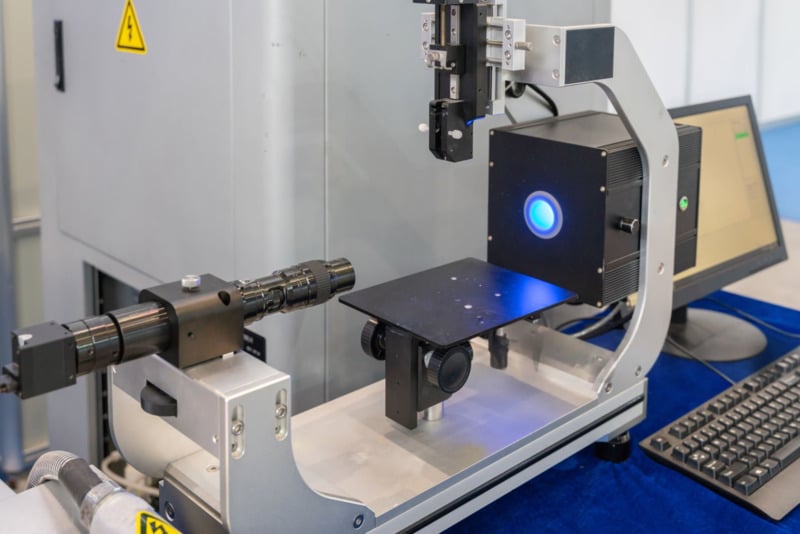 Laser inspection machine in a laboratory setting.