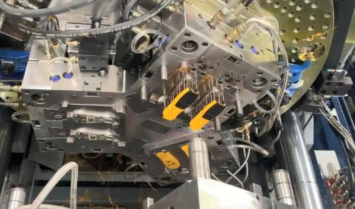 3K injection molding process showing three different material flows