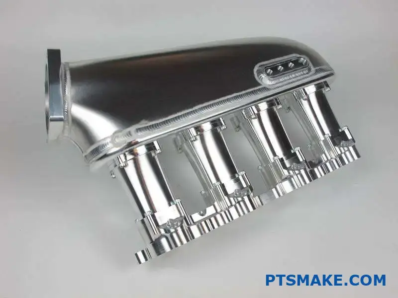 Precision CNC machined intake manifold with bolts and fittings
